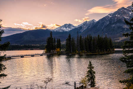 Canadian rockies with blue sky reflection on Maligne lake in Jasper, Canadaの写真素材
