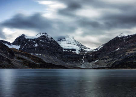 Served slice bread with hot espresso in a cup on  wooden lodge at national parkの写真素材