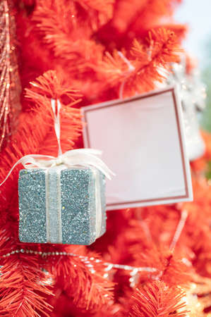 Open modern gray laptop on glass table in spring garden on sunnyの写真素材