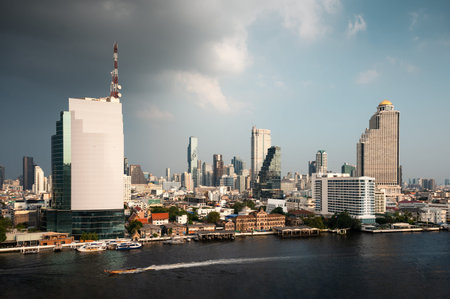 Bangkok city with office buildings in downtown near the Chao Phraya waterfront at Thailandのeditorial素材