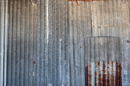 Old rusted decay galvanized fence or roof backgroundの写真素材