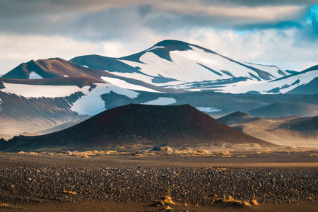 Dramatic landscape of volcanic mountain range with crater on wilderness in summer at Landmannalaugar, Icelandの写真素材