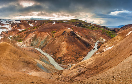 Landscape of Kerlingarfjoll volcanic mountain range on geothermal area and sulphur smoke in Hveradalir trail on summer at Highlands of Icelandの写真素材