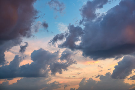 Beautiful dramatic colorful sunset sky with clouds