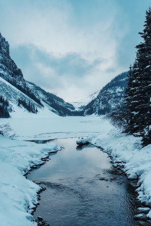 Beautiful view of Frozen Lake Louise during winter in the dawn at Banff national park, Alberta, Canadaの写真素材
