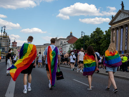 Berlin, Germany - June 26, 2021 - People at the Christopher Streer Day (CSD) demonstration carry a...