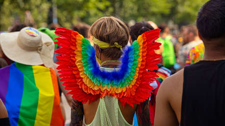 Berlin, Germany - July 24, 2021 - A man wears rainbow angel wings on Christopher Street Day (CSD)のeditorial素材