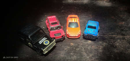 colorful miniature toy cars that many children enjoy doing are often used as toy collectionsの写真素材