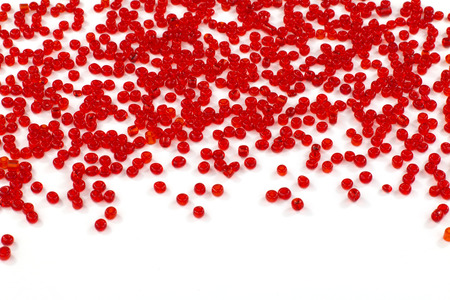 Red beads isolated on white の写真素材