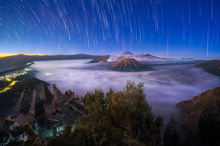 Beautiful starry sky at sunrise over Bromo Tengger Semeru National Park, Java, Indonesiaの写真素材