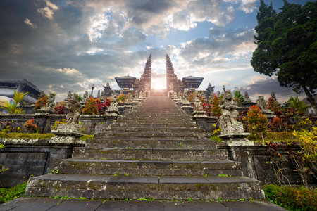 Young female tourist at the temple gate, Bali, Indonesiaの写真素材