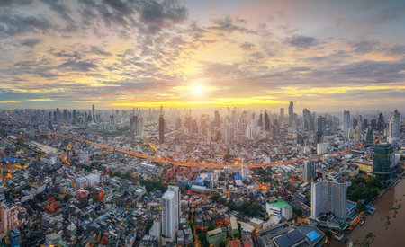 Aerial view of Bangkok cityscape at sunset time, Thailand.
