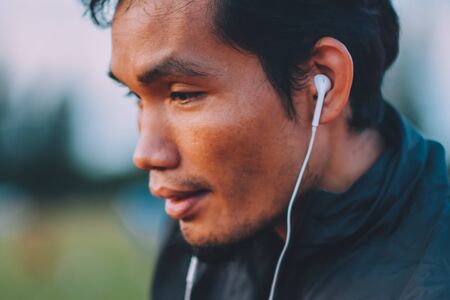 Runner Man jogging or running in evening at sunlightの写真素材