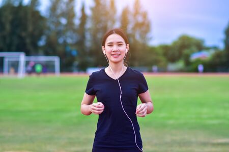 Women listening music when running jogging or exercise,Woman Runner or Girl Runningの写真素材