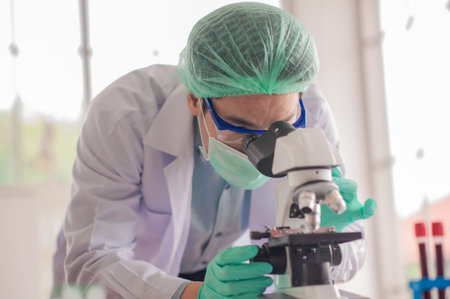Doctors are using a microscope to examine the tissues of cancer.