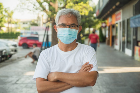 Older man wear face mask protect coronavirus covid19 at the public city
