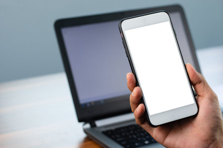 Closeup hand holding phone smartphone mobile phone design screen mockup
