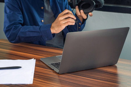 Man using computer notebook working in home office
