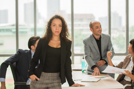 Businesswoman standing in meeting business teamwork , Working woman work smartの写真素材