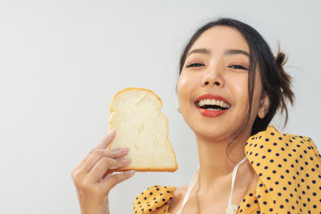 Woman holding bread happy in shop small business