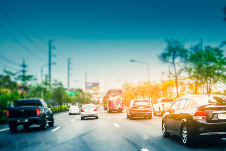 Car driving on street at sunset,Transportation on road conceptの写真素材