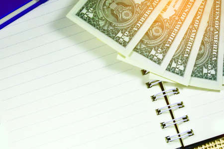 dollar for every day shopping,One dollar banknote is on wood floor,Money of Americaの写真素材