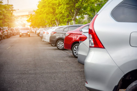 Car parked row on road,Cars parking in line on street