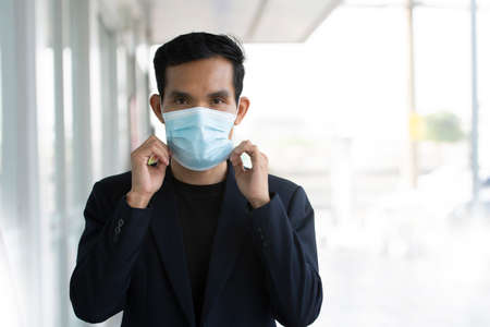 Businessman wears face maskの写真素材
