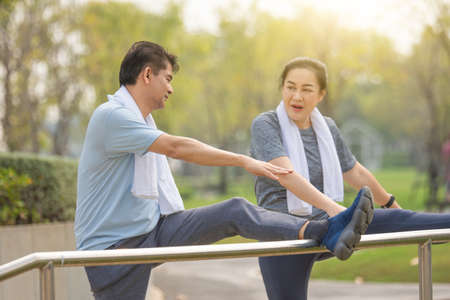 Retired couple exercising happily and healthy, retirement age exercise, Elderly life insuranceの写真素材