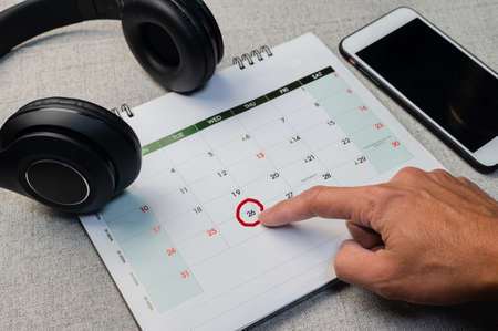 Hand point on 26 October for Black Friday saleの写真素材