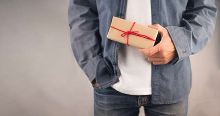 People holding gift box, new year gift box, Christmas gift box ,copy space. Christmas, hew year, birthday concept.の写真素材