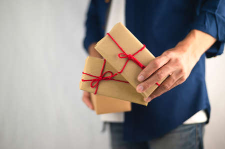 People holding gift box, new year gift box, Christmas gift box ,copy space. Christmas, hew year, birthday concept.の写真素材