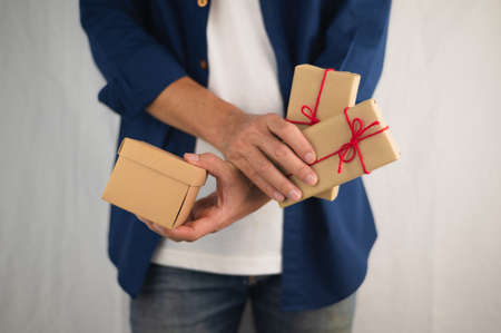 Person holding gift box, new year gift box, Christmas gift box ,copy space. Christmas, hew year, birthday concept.の写真素材