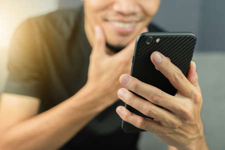 Closeup hand using mobile smartphoneの写真素材