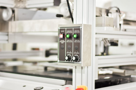 Buttons to control the operation of machines in the manufacturing industry