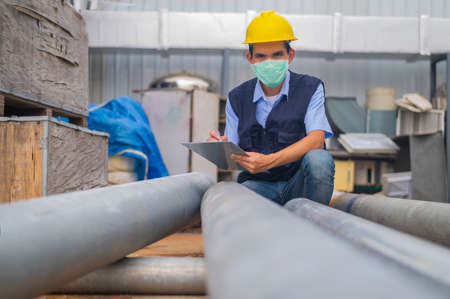 Engineers monitor and control work in the construction area.の写真素材