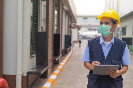 Engineers write industrial factory inspection reports.