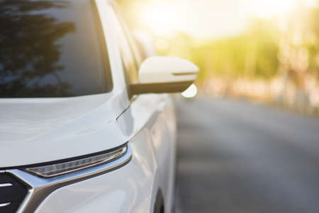 Car on road trip sunlight backgroundの写真素材