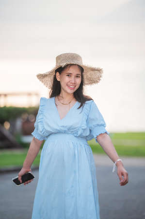pregnant women travel happy holidaysの写真素材