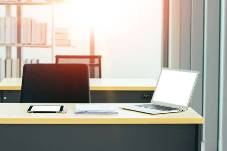 Laptop computer on desk blank screen mockup technologyの写真素材