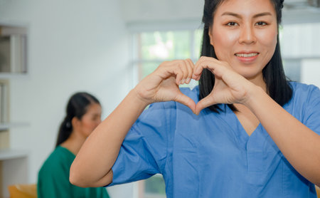Doctor Women hand shape heart healthy care concept and world heart dat conceptの写真素材