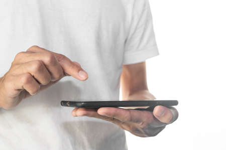 Hand using mobile smartphone touching on screen technologyの写真素材