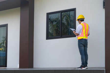 Engineer Auditor checking home building constructionの写真素材