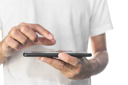 Hand using mobile smartphone touching on screen technology