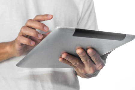 Hand using tablet  touching on screen technologyの写真素材