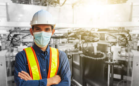 Engineer working in factory for industrial with technology machine equipmentの写真素材