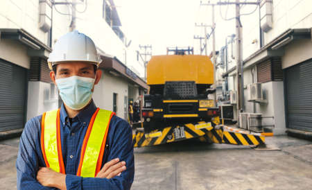 Engineer working in factory for industrial with technology machine equipmentの写真素材