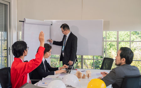 Team business meeting or workshop for development company investment real estateの写真素材