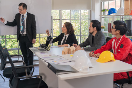 Team business meeting or workshop for development company investment real estateの写真素材