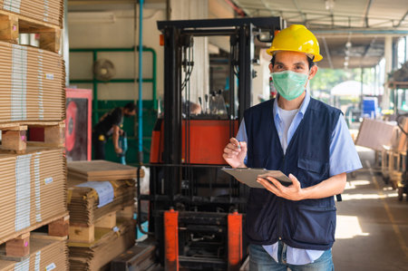 Worker checking raw material in store for factory industrial, Safety Engineerの写真素材